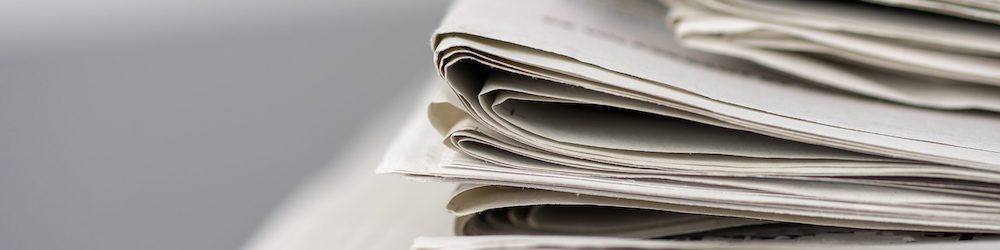 Image of a stack of newspapers
